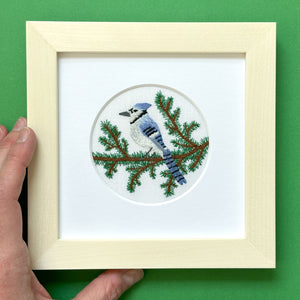 Blue Jay and Pine Branches on White Linen Hand Embroidered Art