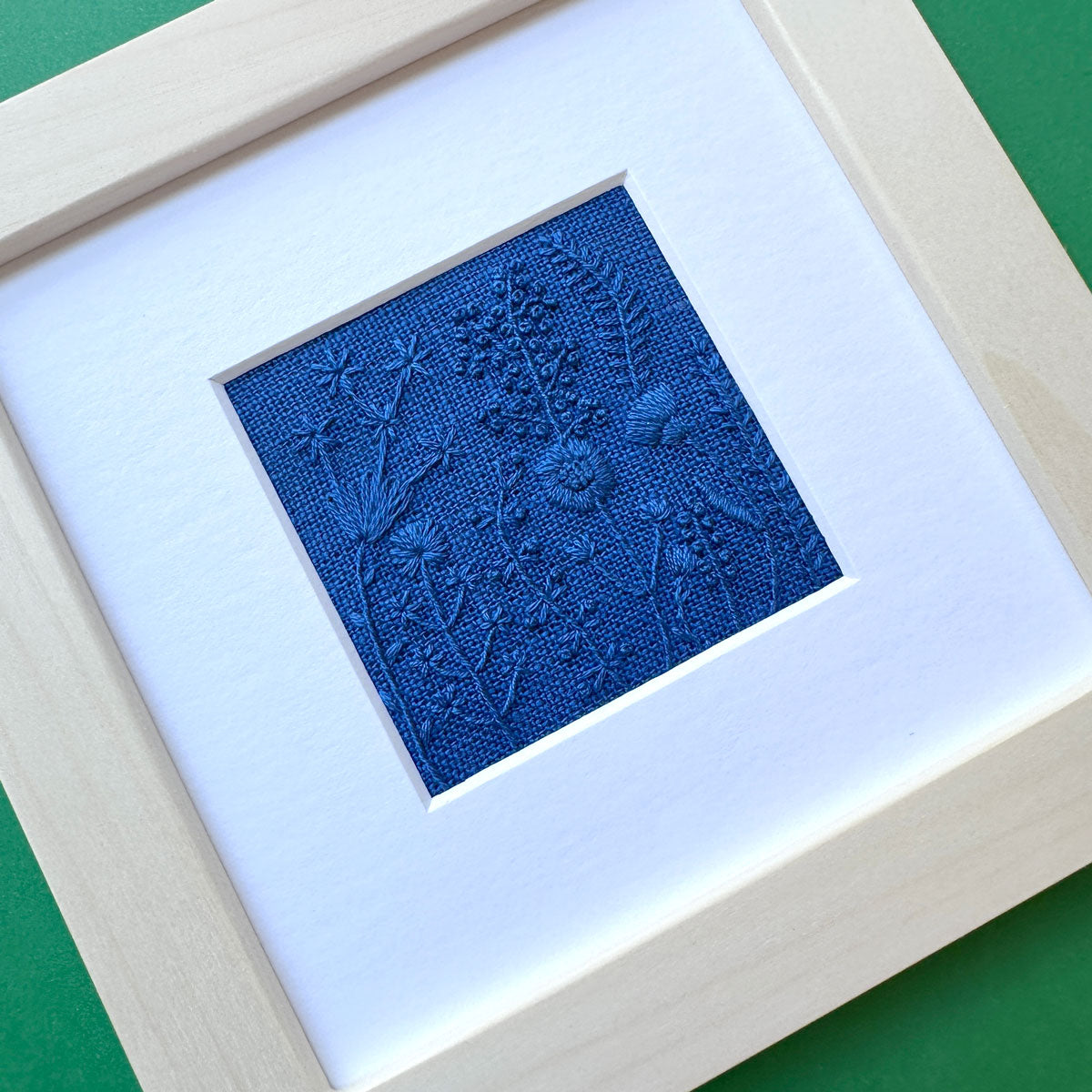 Monochromatic Blue Flowers (2.5") on Blue Linen Hand Embroidered Art (Copy)