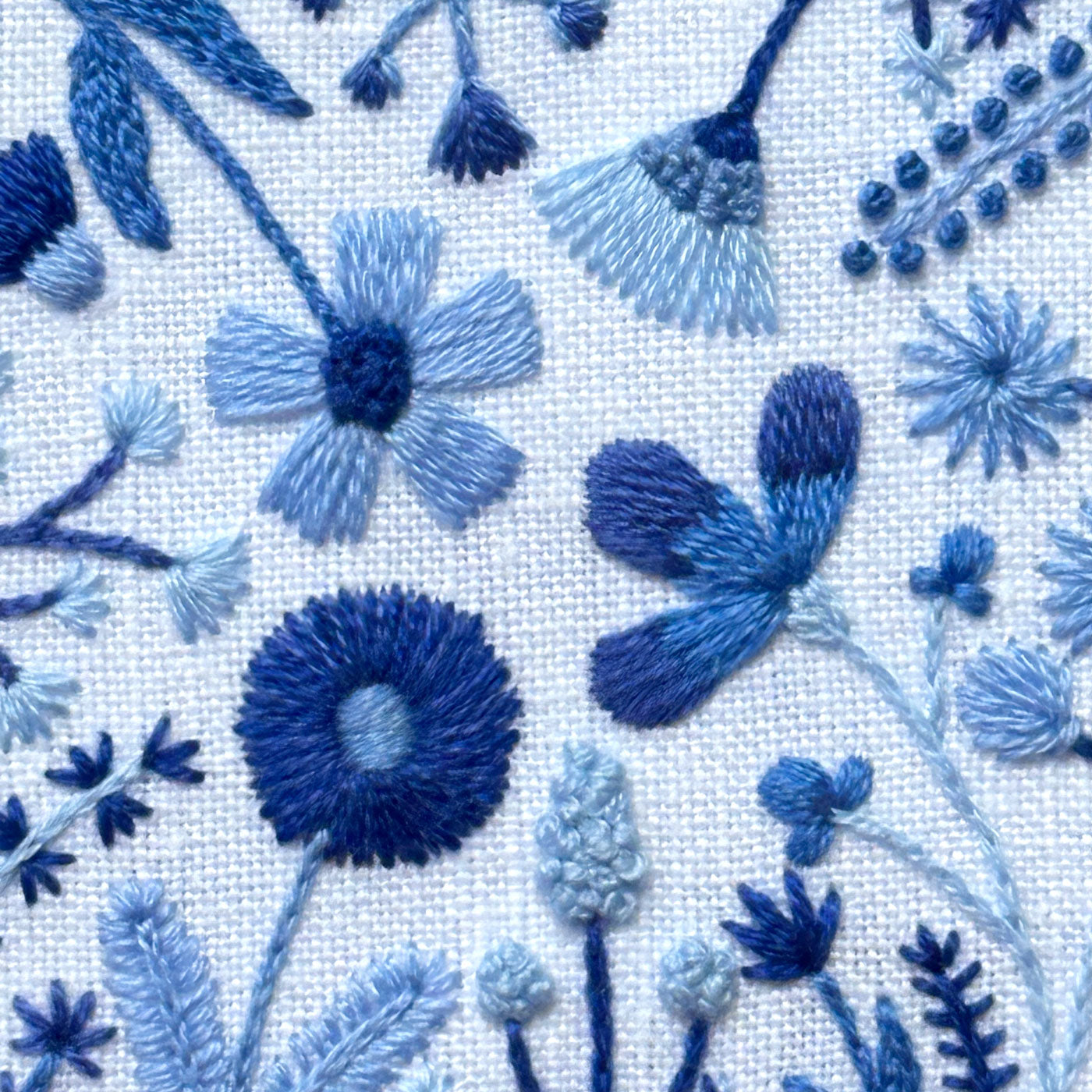 Blue Flowers (3.00")  on White Linen Hand Embroidered Art