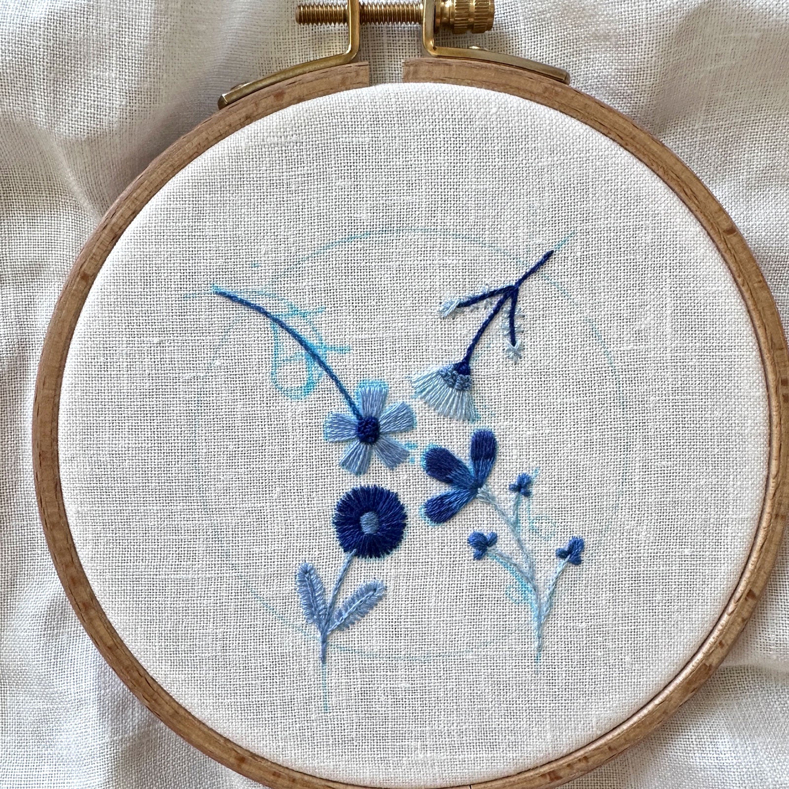 Blue Flowers (3.00")  on White Linen Hand Embroidered Art