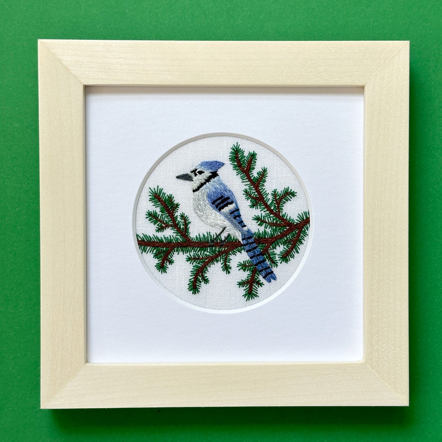 Blue Jay and Pine Branches on White Linen Hand Embroidered Art