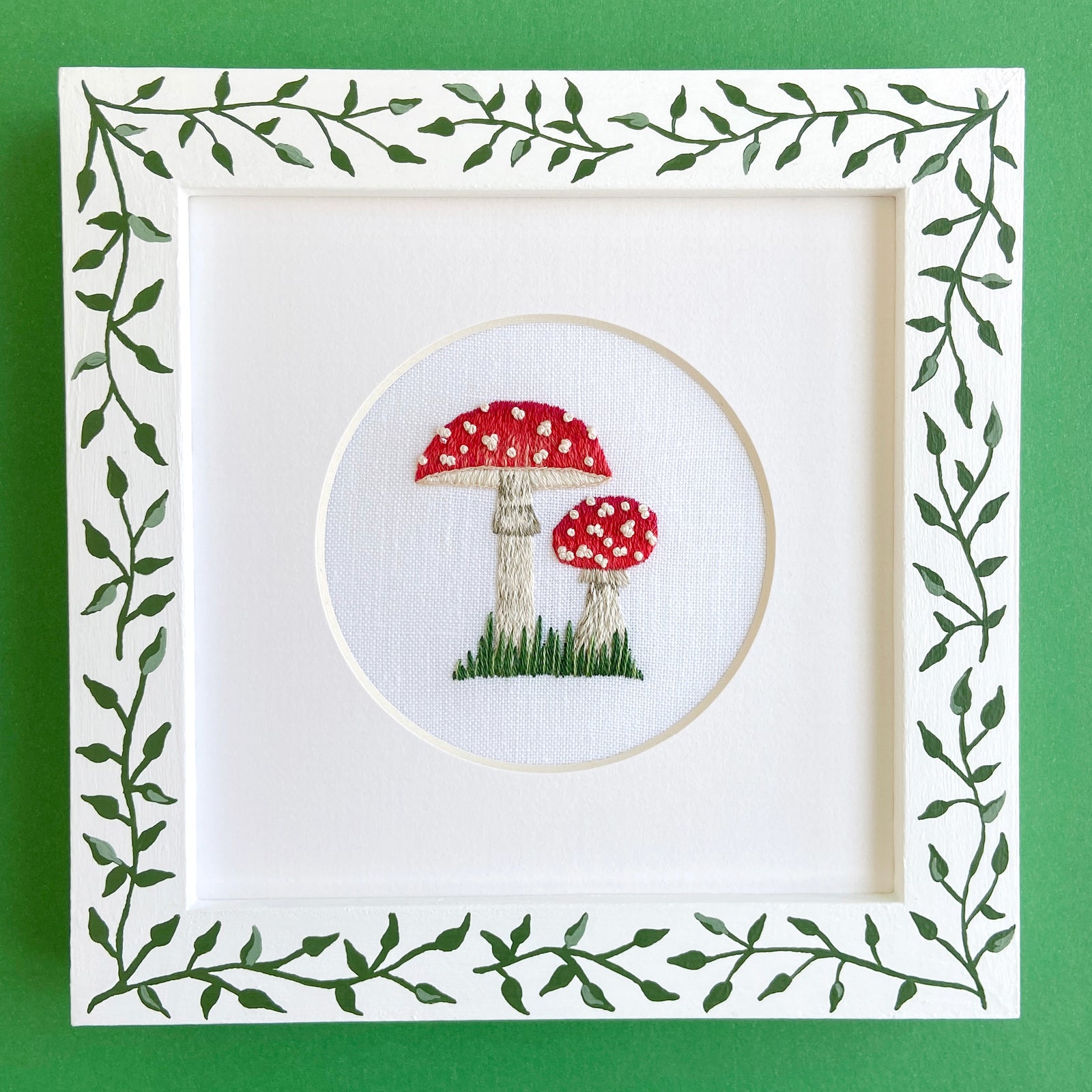 Two Amanita muscaria Mushrooms on White Linen Hand Embroidered Art