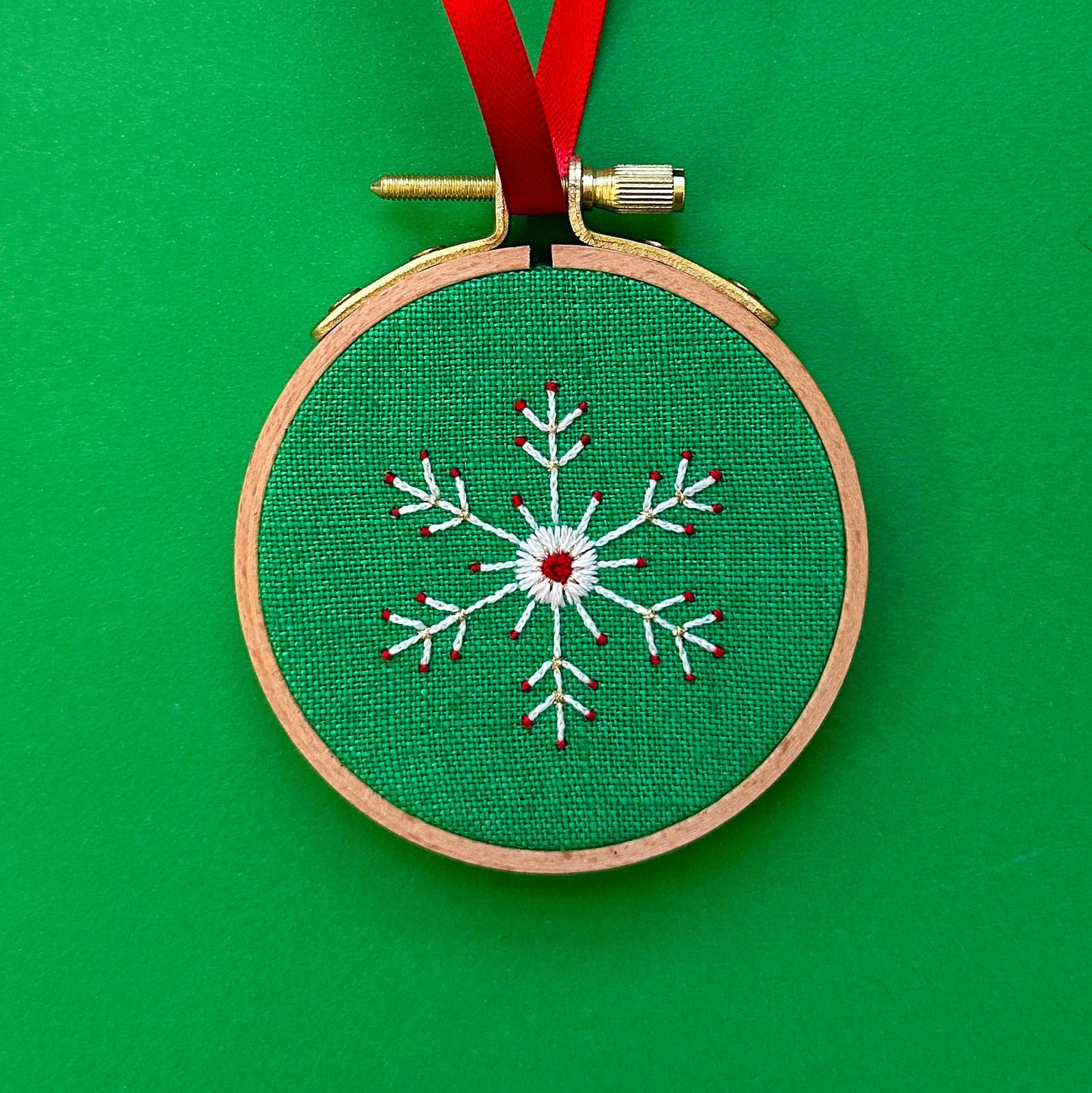Embroidered Ornament A - White Snowflake on Green Linen