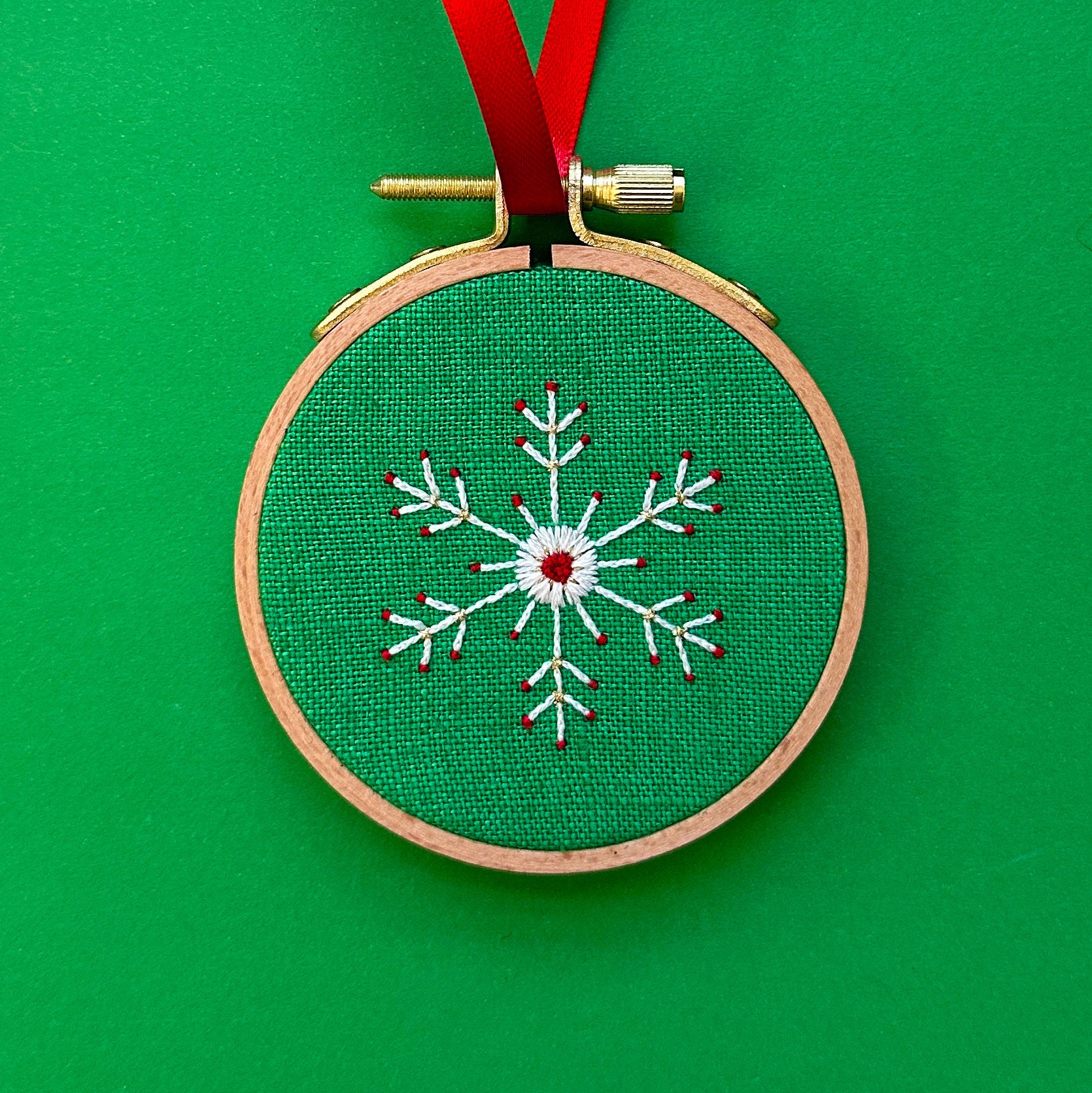 Embroidered Ornament A - White Snowflake on Green Linen