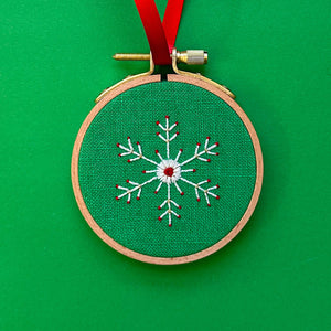 Embroidered Ornament A - White Snowflake on Green Linen