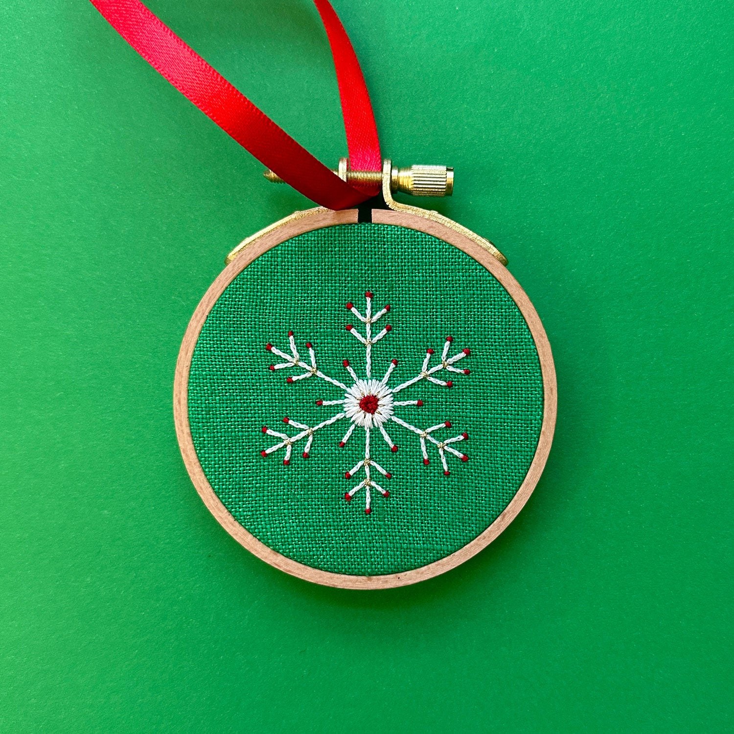 Embroidered Ornament A - White Snowflake on Green Linen