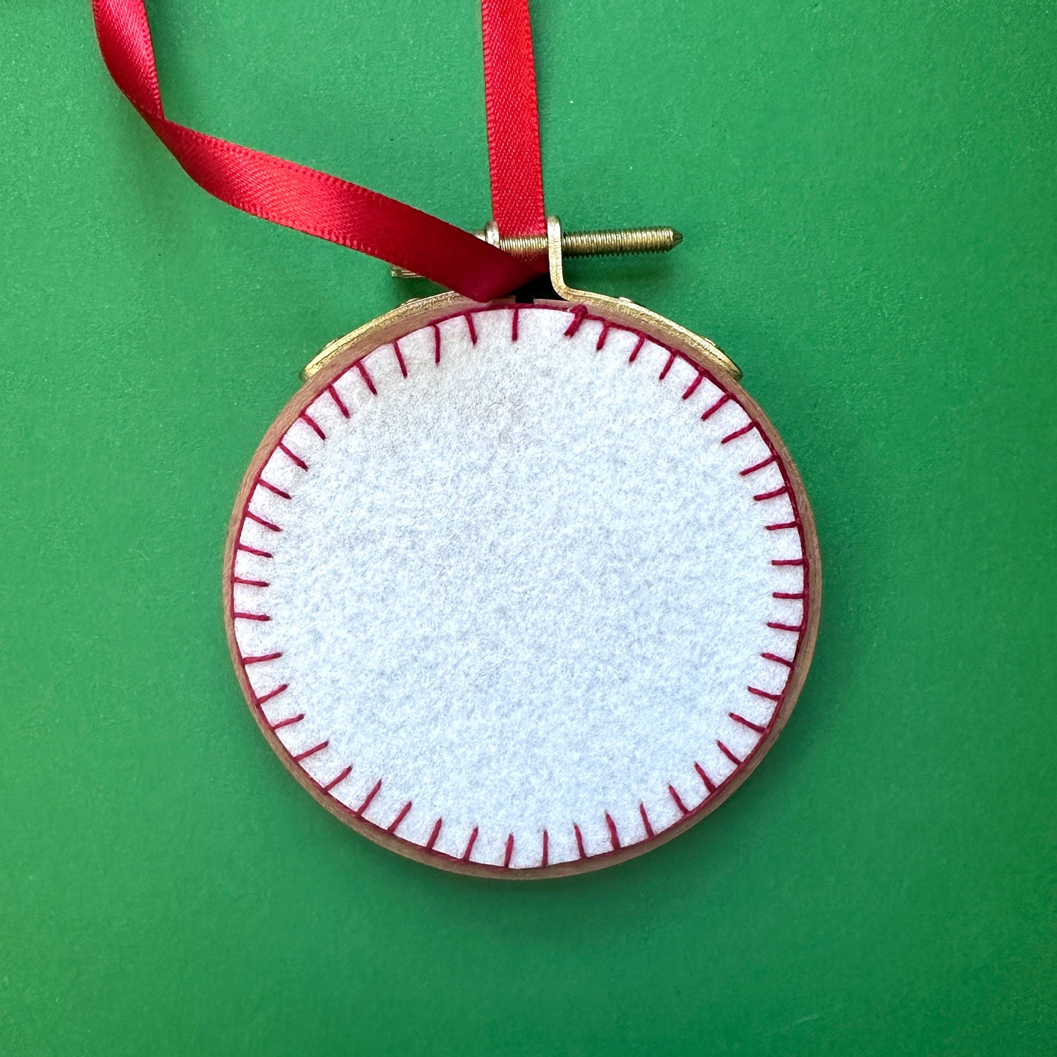 Embroidered Ornament B - Red and Green Snowflake on White Linen