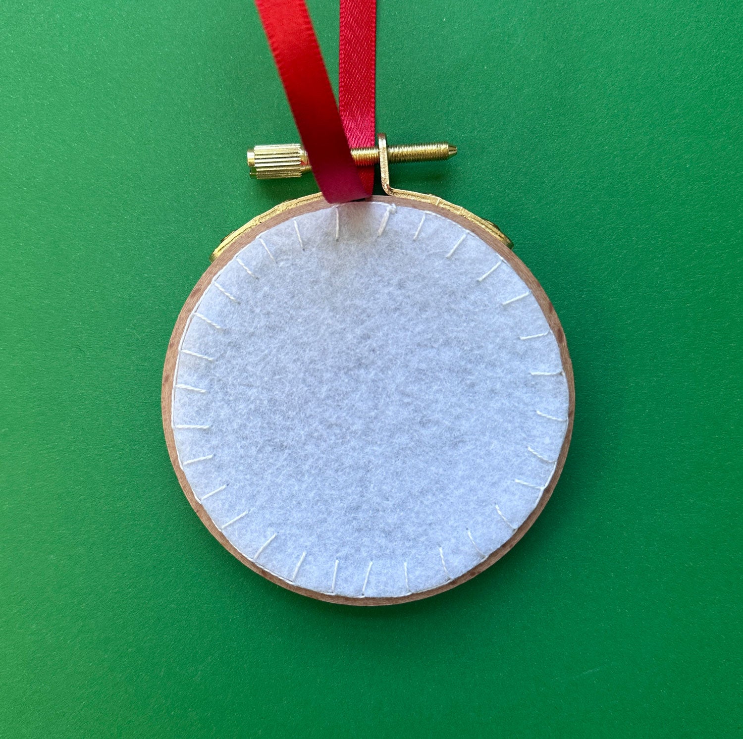 Embroidered Ornament C - Red Snowflake on White Linen