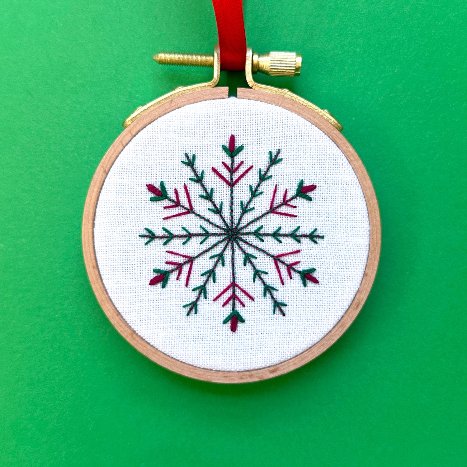 Embroidered Ornament D - Green and Red Snowflake on White Linen