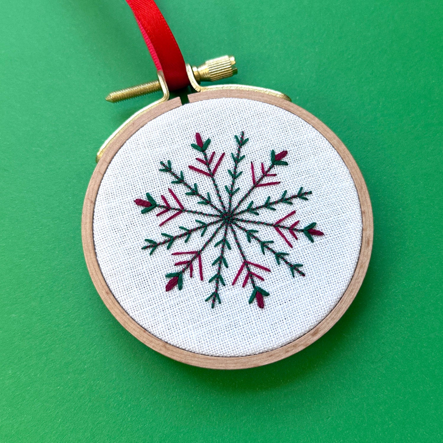 Embroidered Ornament D - Green and Red Snowflake on White Linen