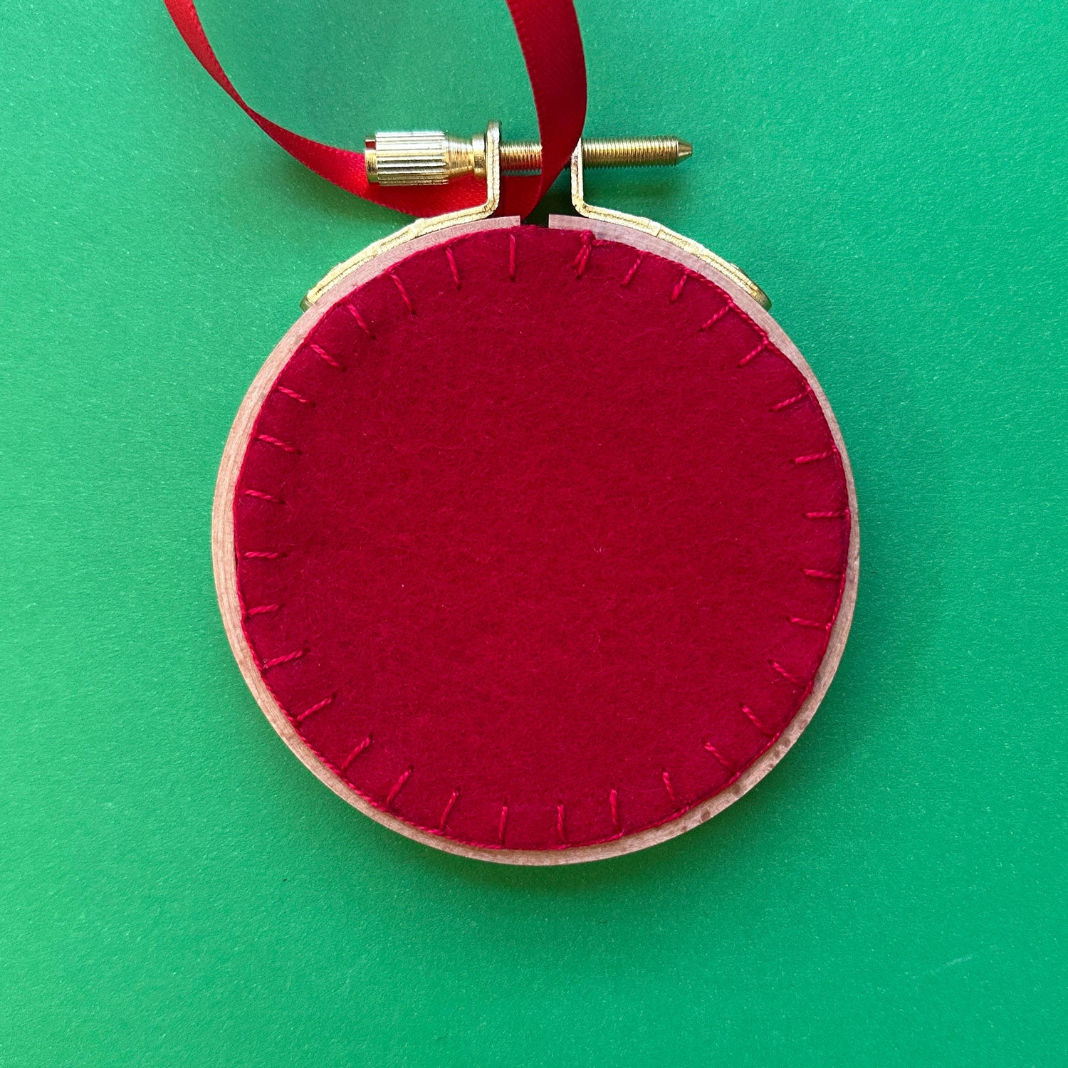 Embroidered Ornament E - White Snowflake on Red Linen