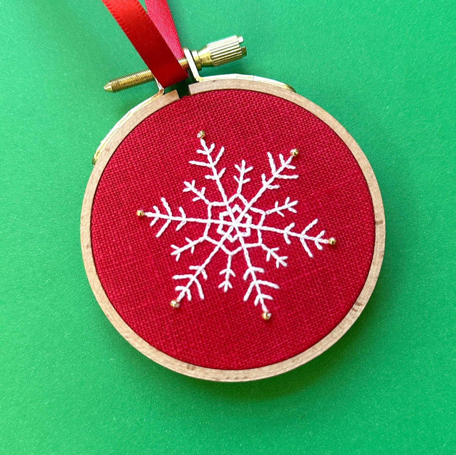 Embroidered Ornament E - White Snowflake on Red Linen