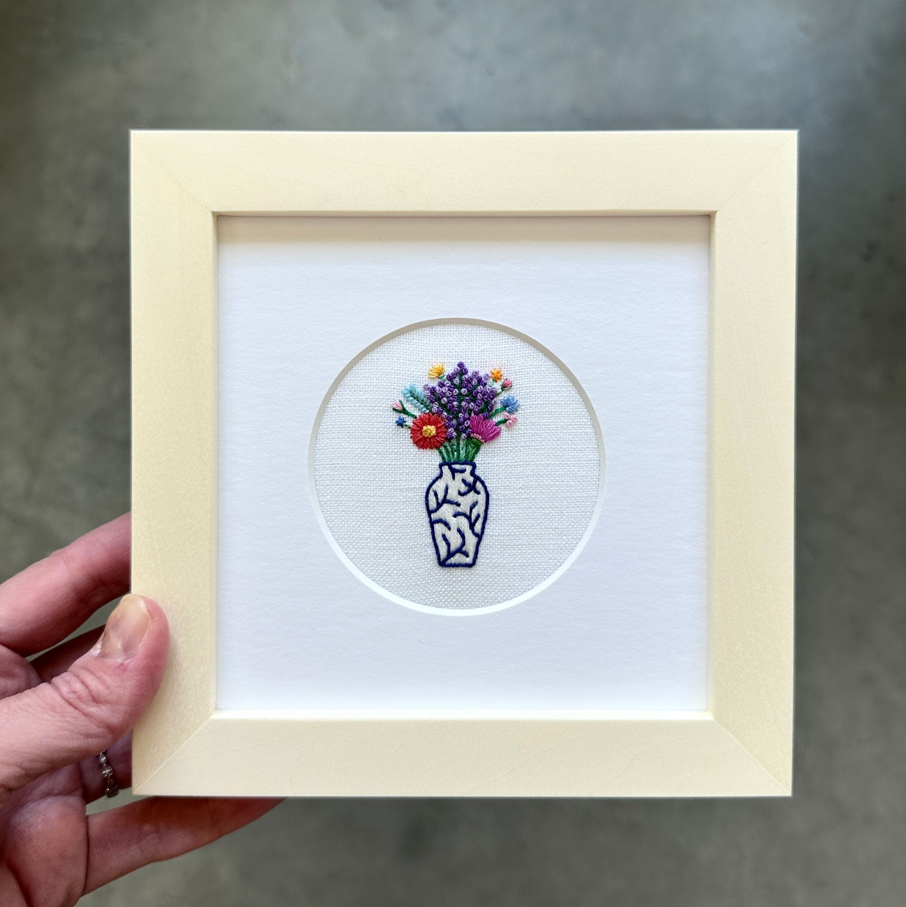 Rainbow Flowers in Blue and White Vase on White Linen Hand Embroidered Art