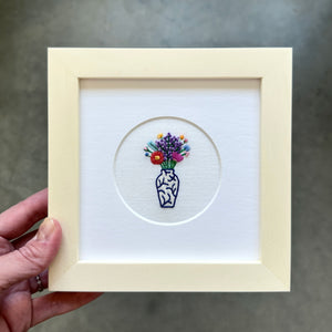 Rainbow Flowers in Blue and White Vase on White Linen Hand Embroidered Art