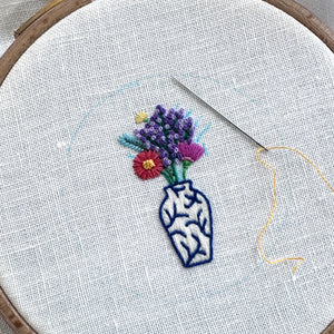 Rainbow Flowers in Blue and White Vase on White Linen Hand Embroidered Art