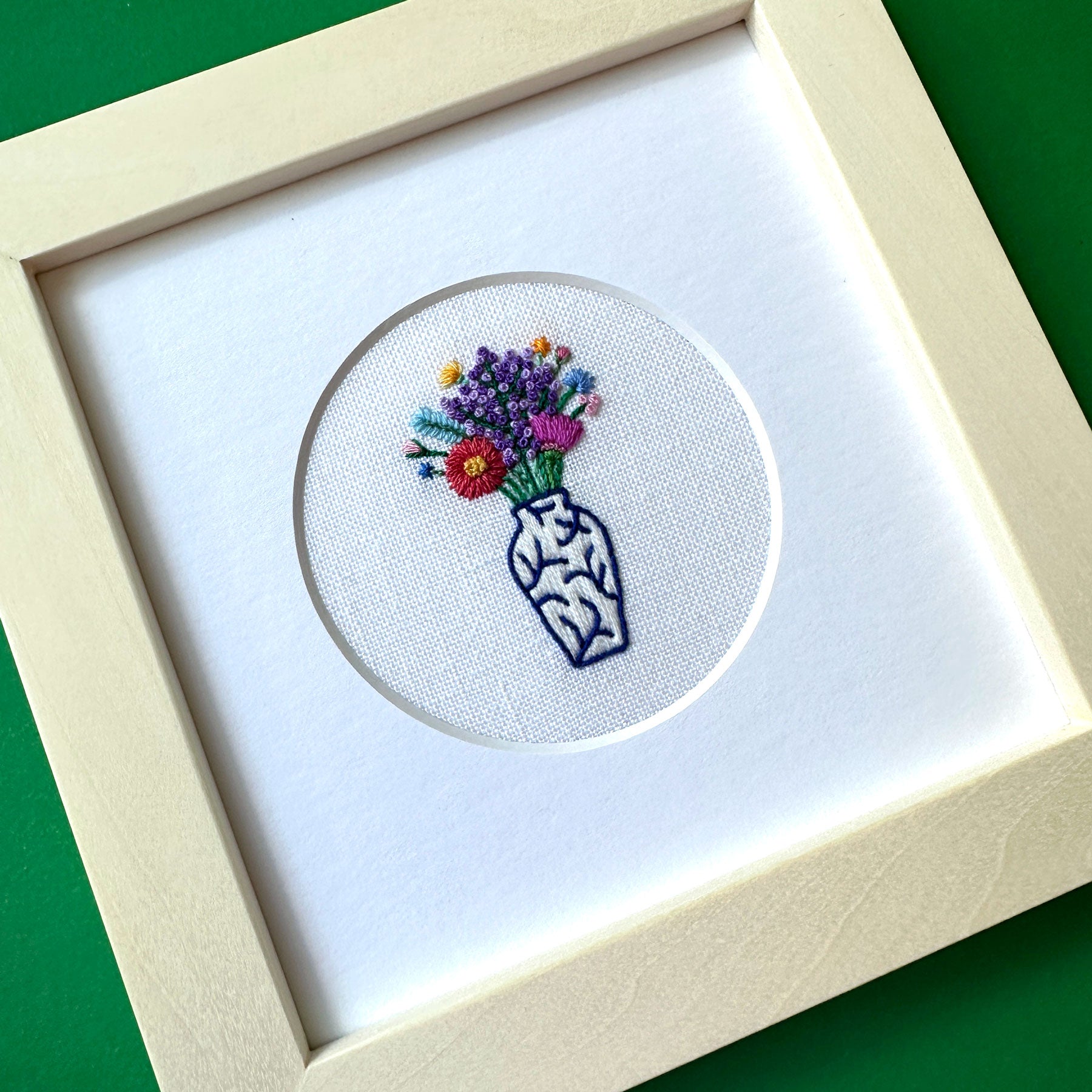 Rainbow Flowers in Blue and White Vase on White Linen Hand Embroidered Art