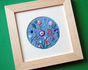 Purple, Orange, and Pink Flowers (3") on Light Blue Linen Hand Embroidered Art