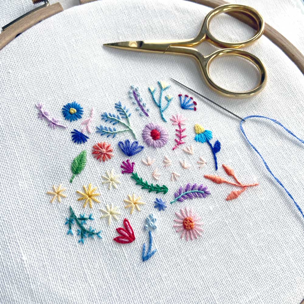 Rainbow Flowers (4.375 inches) on White Linen Hand Embroidered Art