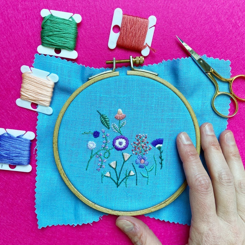 Purple, Orange, and Pink Flowers (3") on Light Blue Linen Hand Embroidered Art