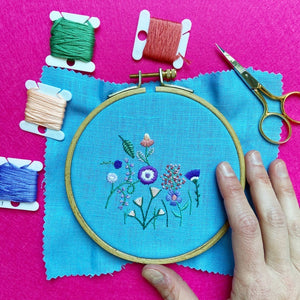 Purple, Orange, and Pink Flowers (3") on Light Blue Linen Hand Embroidered Art