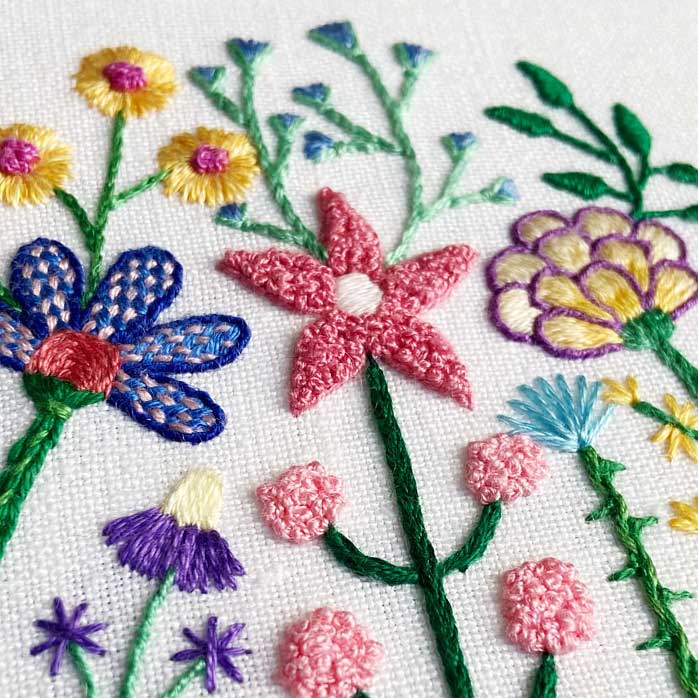 Mega Texture Colorful Flowers (3") on White Linen Hand Embroidered Art