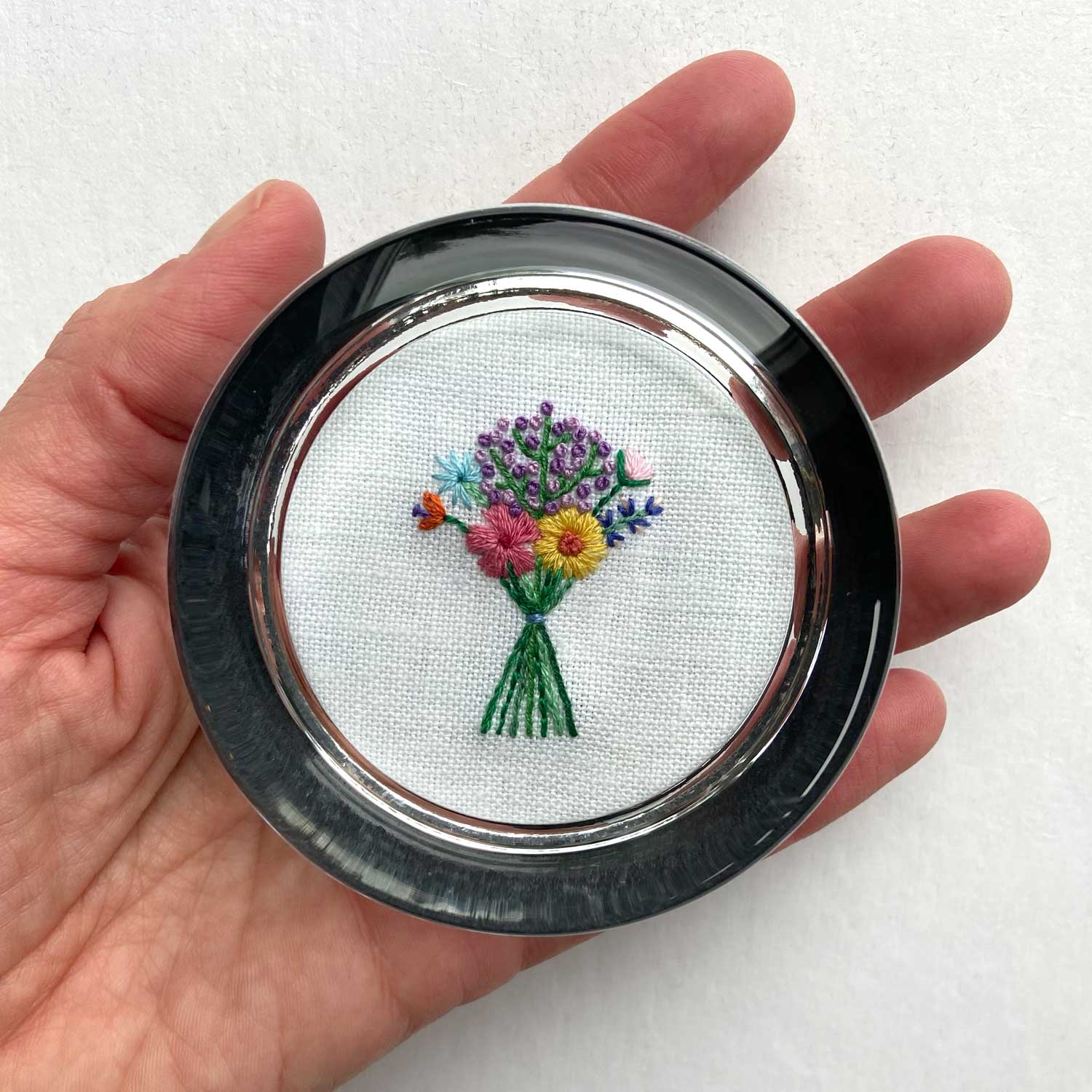 Bouquet with Purple Buds on White Linen Hand Embroidered Paperweight