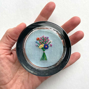 Bouquet with Pink Buds on Light Blue Linen Hand Embroidered Paperweight