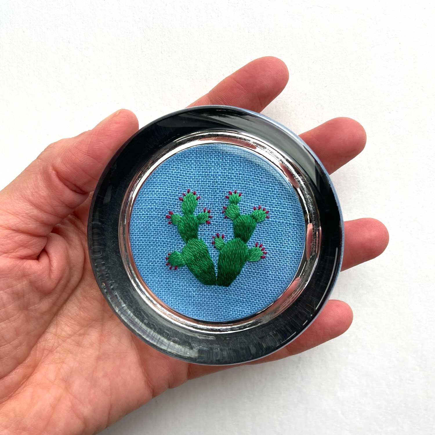 Prickly Pear Cactus on Blue Linen Hand Embroidered Paperweight