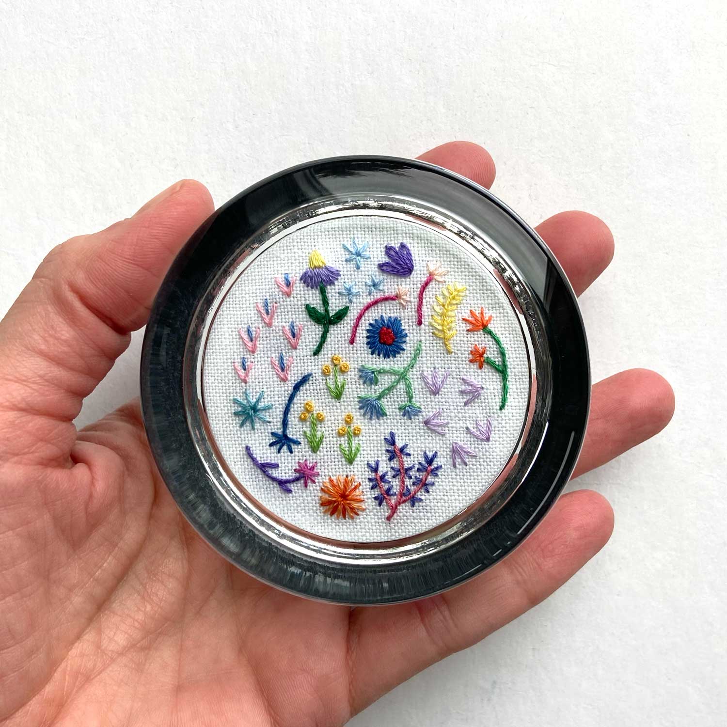 Rainbow Flowers on White Linen Hand Embroidered Paperweight