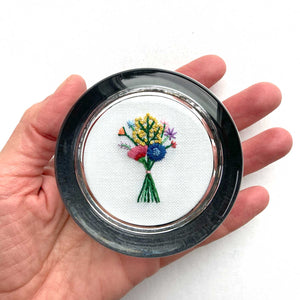 Bouquet with Yellow Buds on White Linen Hand Embroidered Paperweight